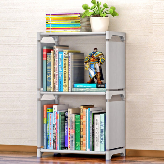 Gray plastic book storage rack with three open shelves and front side panels