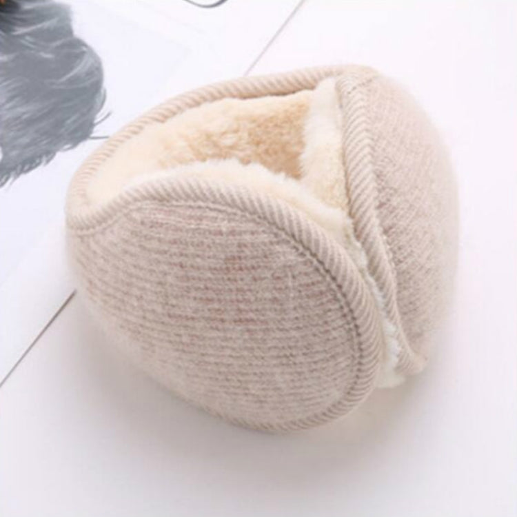 Beige plush earmuffs with wide ribbed ear band and soft ear cushions