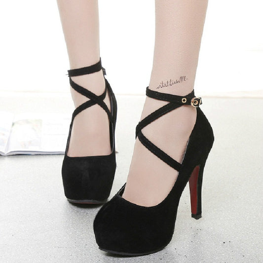 Black suede stiletto heels with round toe and crisscross ankle straps