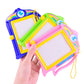 Magnetic drawing board set showing colored frames, blank screens, and fingers pressing one board
