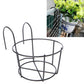 Black round metal flower pot stand with two-tier circular basket and tall curved legs