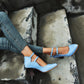 Women’s blue double-buckle heeled sandals with ankle straps and block heel