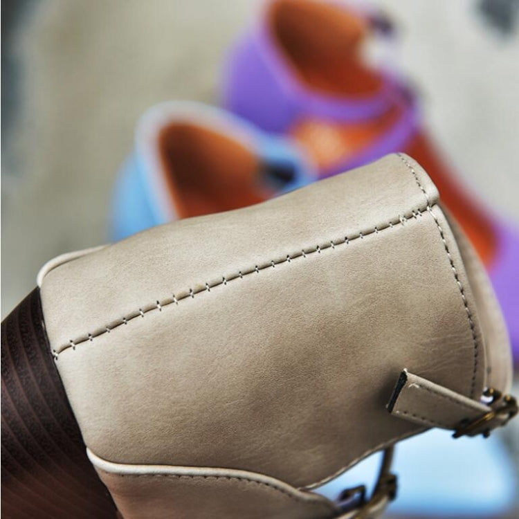 Women’s taupe heeled shoe with ankle strap, stitched panel, and dark block heel