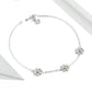 Silver daisy charm bracelet with yellow center flower charms and clasp