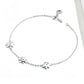 Silver daisy bracelet with multiple flower charms and round link chain