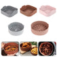 Assorted silicone air fryer grill pan inserts in gray, brown, and pink, with ridged surface