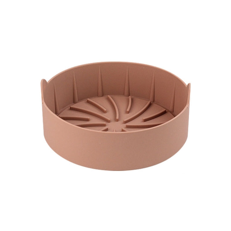 Coffee brown round silicone grill pan insert with ridged radial channels and center hub