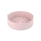 Pink round silicone grill pan insert, ridged radial channels with raised center detail