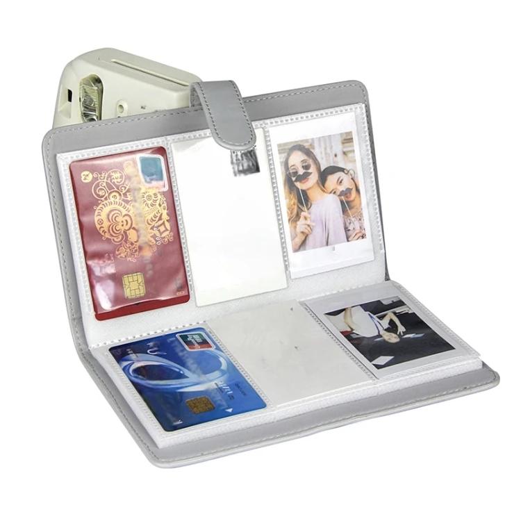 3-inch PU photo album opened, light gray cover with multi-photo card sleeves