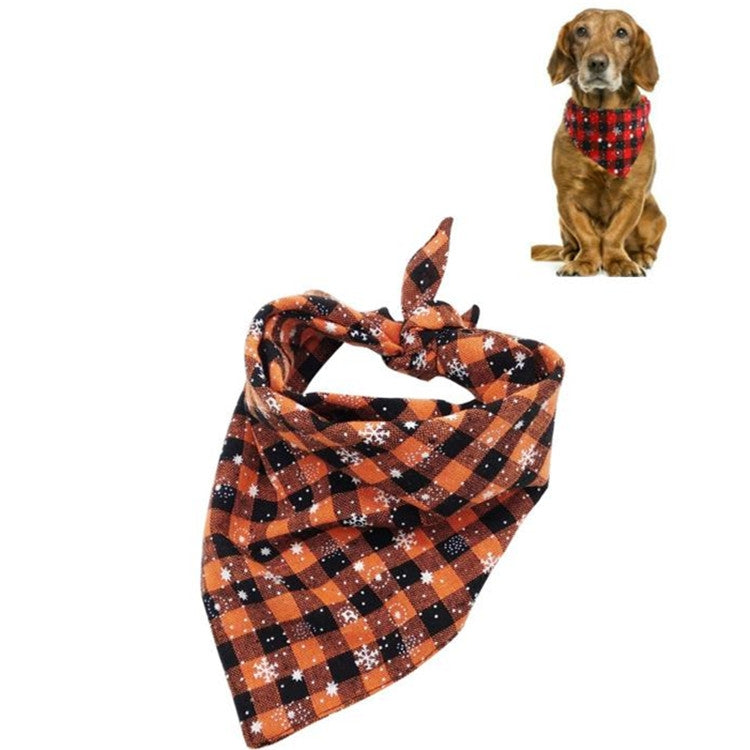 Pet triangle bandana towel in orange and black plaid with white snowflake pattern