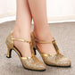 Gold sequined Mary Jane Latin heels showing ankle strap and low block heel
