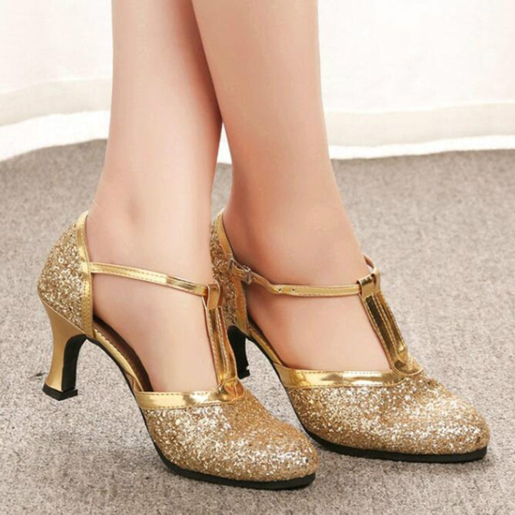 Gold sequined Latin heels with buckle ankle strap and low block heel