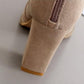Camel suede ankle boot back view with side zipper and block heel