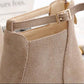 Camel suede ankle boot collar close-up with buckle strap and lining