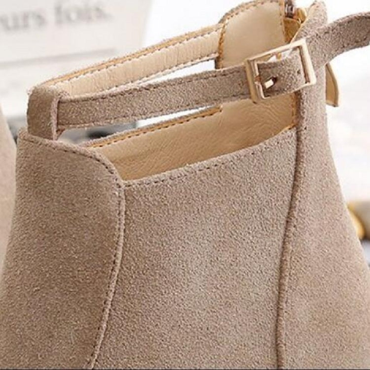Camel suede ankle boot collar close-up with buckle strap and lining