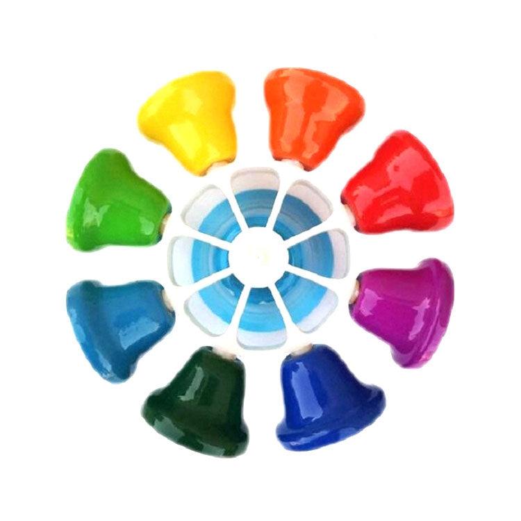 Eight-tone bell percussion toy top view with eight colorful bells around a white wheel