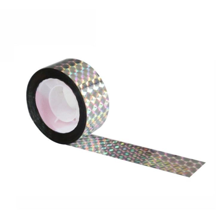 Reflective iridescent bird repeller ribbon roll with black core and multicolor strip