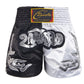 Muay Thai boxing shorts, black and white, ZhuoAo sports logo patch on waistband
