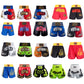 Assorted Muay Thai boxing shorts in multiple colors with various flame and logo designs