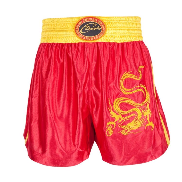Muay Thai boxing shorts with yellow waistband, red fabric, and gold dragon emblem