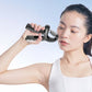 Black mechanical hand gripper held in hand with spring tension