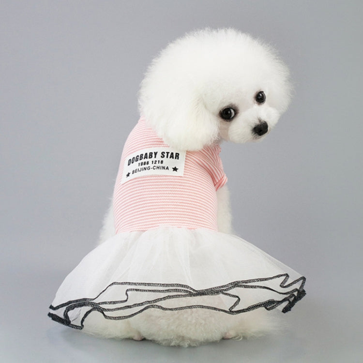 Pink striped pet skirt with white tulle hem on small white dog