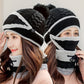 Black-and-white striped knit winter beanie with attached face mask and neck scarf