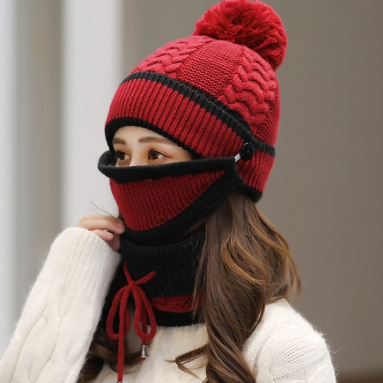 Red knit winter beanie with pom and attached face mask with neck scarf