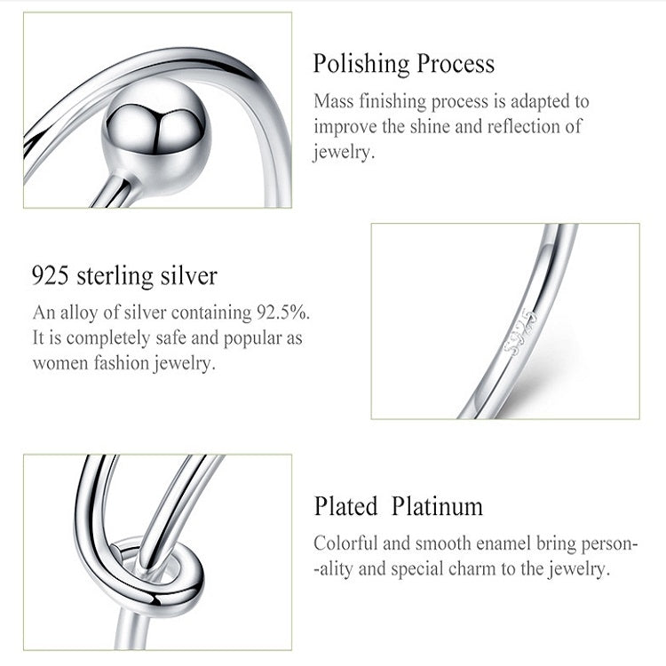 Polished silver open ring with round ball top, shown in a close-up view