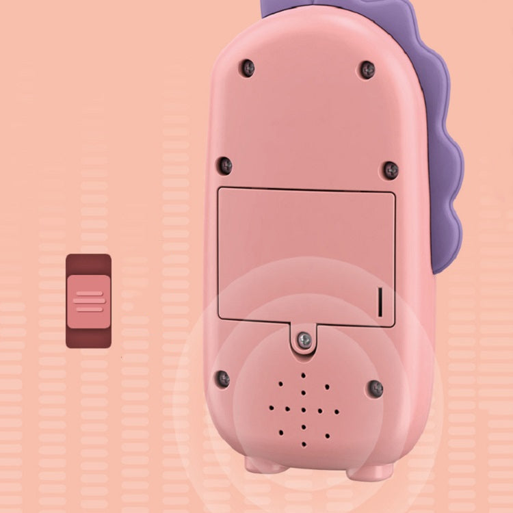 Back of a pink dinosaur toy smartphone with speaker and port