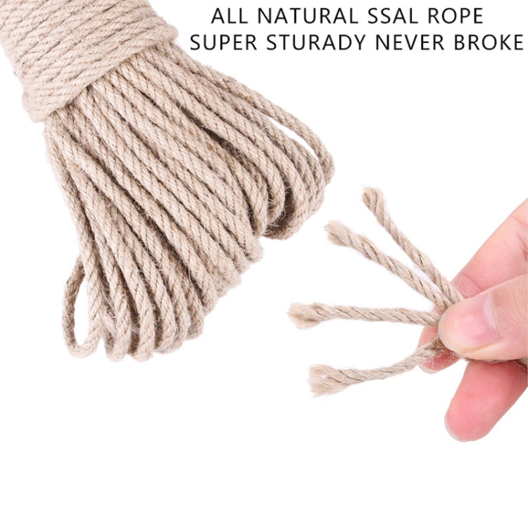 Natural beige hemp rope strand pulled apart by a hand, showing loose fibers