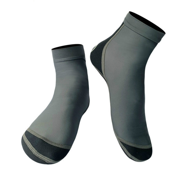 Dark gray neoprene snorkeling socks with light gray seams and textured sole