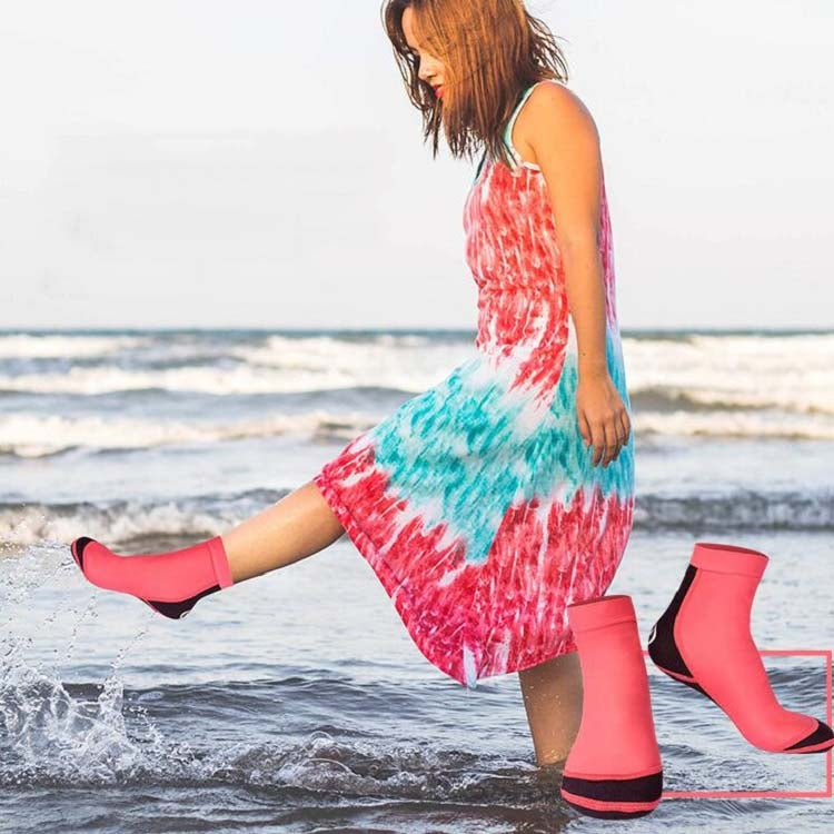 Red neoprene snorkeling socks with black toe and anti-slip sole