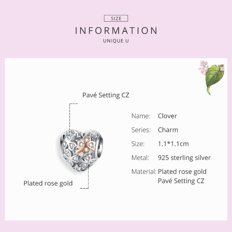 Heart-shaped sterling silver clover charm with beaded hollow design and rose gold accent