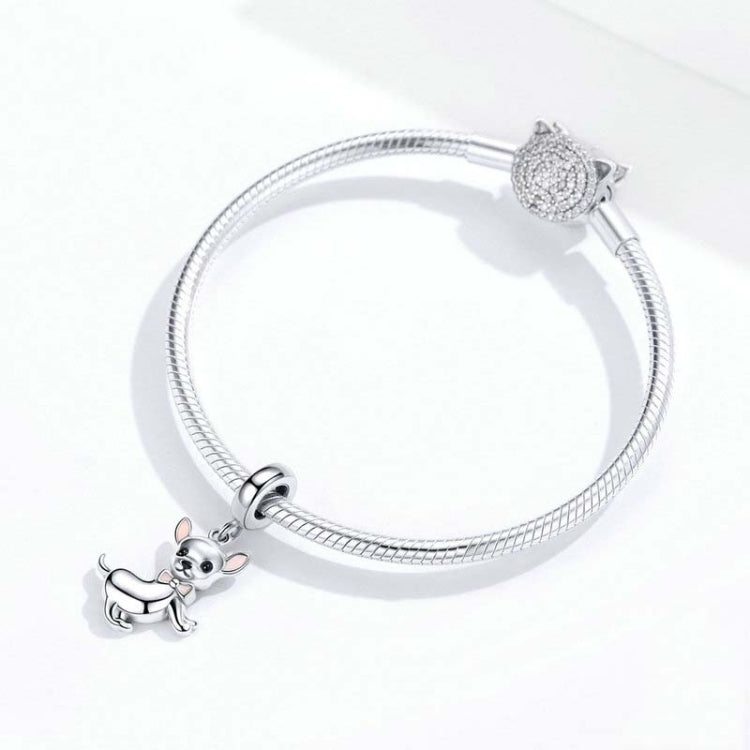 Chihuahua dog charm on silver snake-chain bracelet with heart-shaped clasp