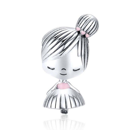 Sterling silver little girl doll charm with striped head and pink enamel details