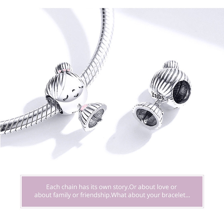 Sterling silver bracelet charm with doll figure and two striped end bead caps