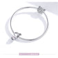Silver snake chain bracelet with charm bead ends and small heart-like charm