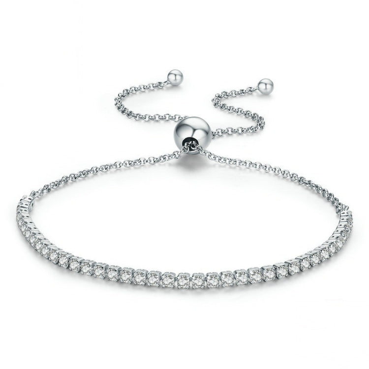 Adjustable silver tennis bracelet with round rhinestone rows and ball clasp charm
