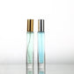 Transparent 10ml perfume spray glass bottles, gold and silver caps, green and blue liquid