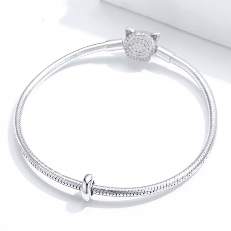 Silver snake-chain bracelet with 925 oval bead charm and round textured spacer