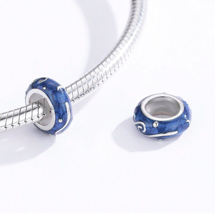 Blue star-glow enamel charm bead on a silver snake chain