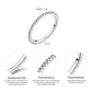 Sterling silver pavé ring with small clear stones, slim band