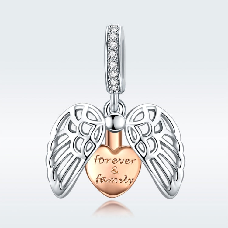 Sterling silver angel wing heart charm with cubic zirconia bail and engraved heart