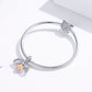 Sterling silver charm bracelet with snake chain, round clasp, and dangling leaf charm