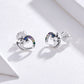 Silver stud earrings with multicolor zircon heart designs