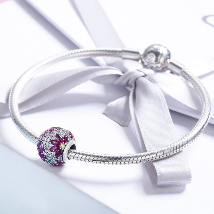 Round purple gemstone bead charm on silver snake bracelet with satin tie