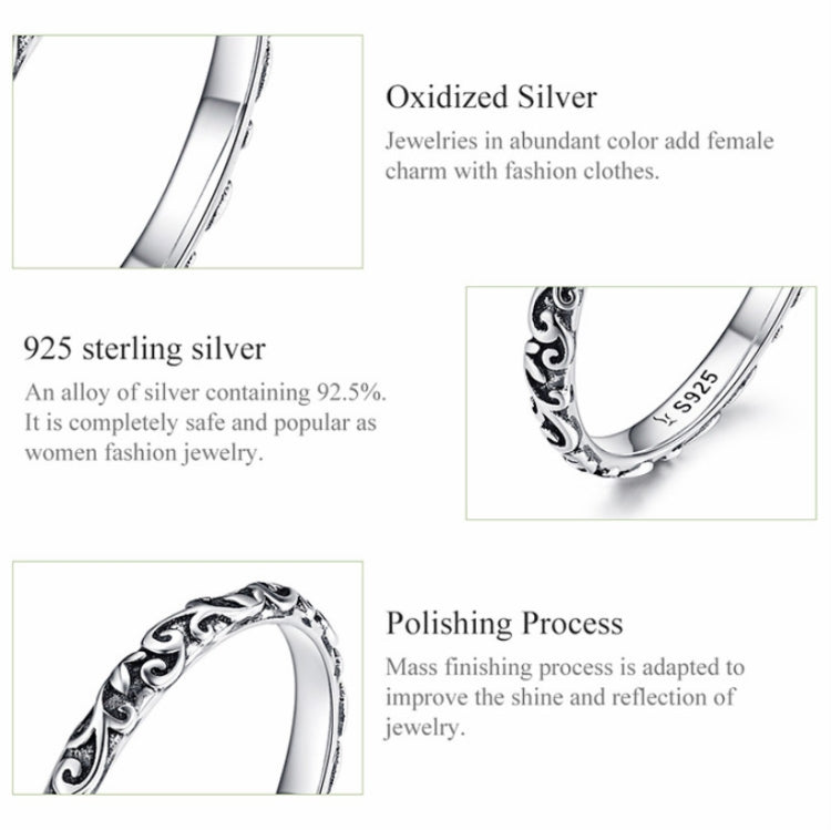 Sterling silver 925 pattern ring detail, ornate scrollwork band close-up