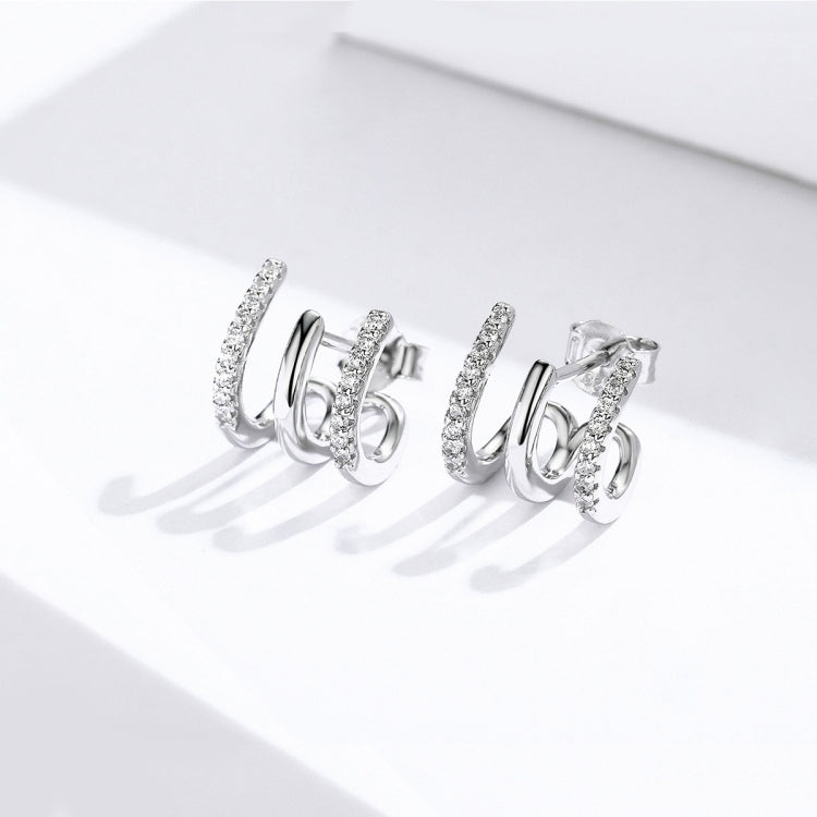 Sterling silver three-layer twisted earrings with zircon accents