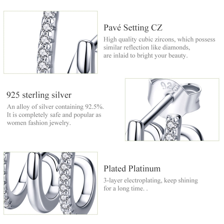 Sterling silver twisted hoop earrings with zircon accents